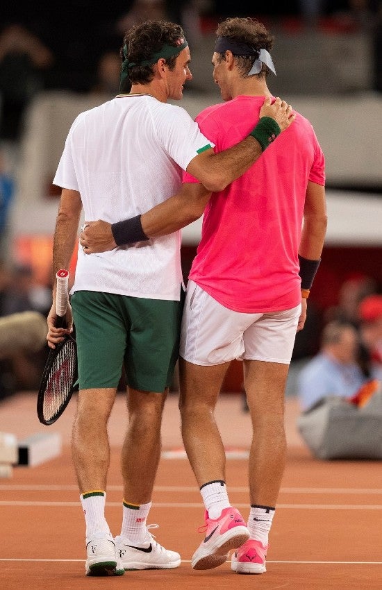 Rafael Nadal junto a Roger Federer tras un partido