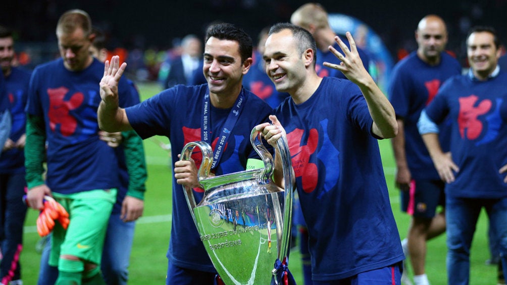 Xavi Hernández y Andrés Iniesta