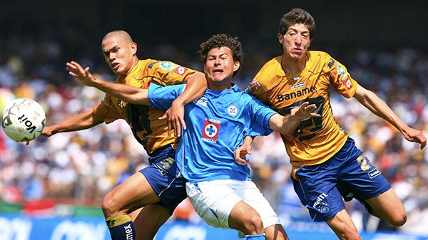 Darío Verón y Marco Palacios durante un partido 