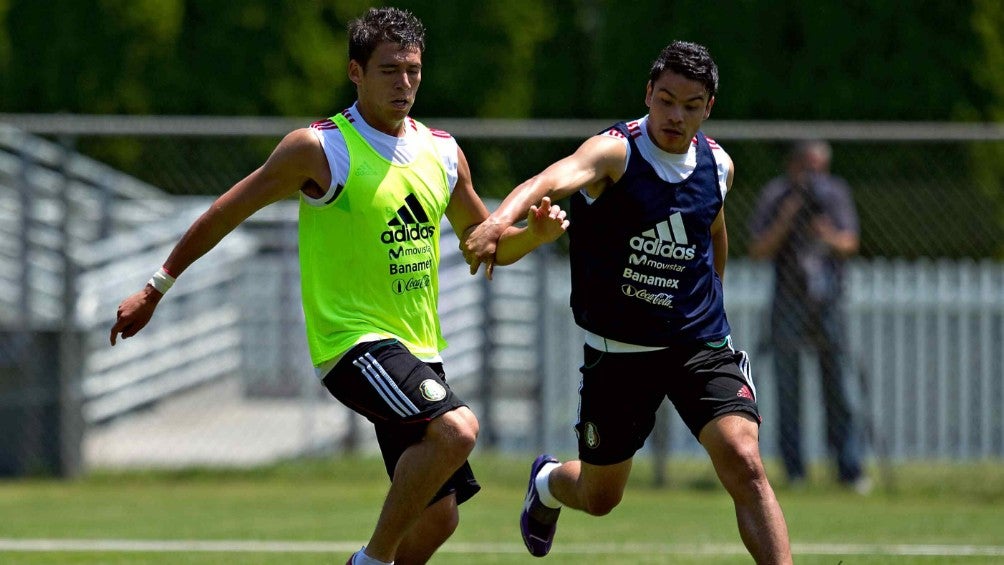 Héctor Moreno y Pablo Barrera durante un entrenamiento con el Tri