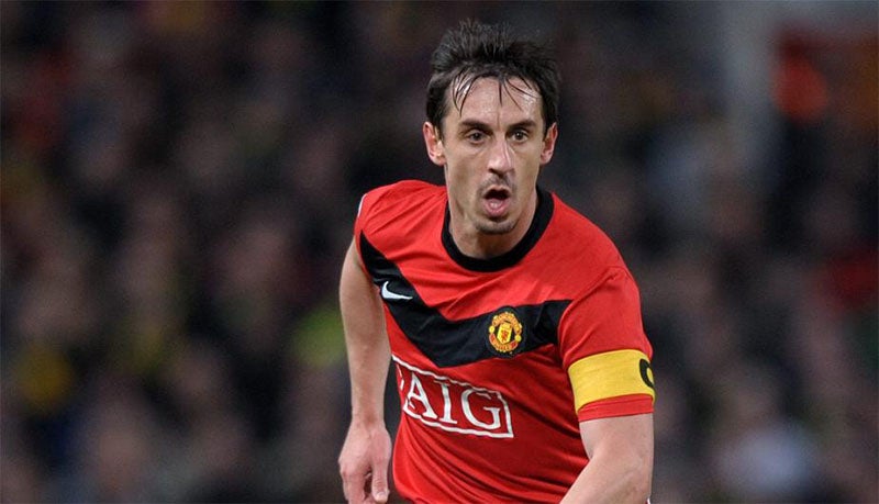 Gary Neville durante un compromiso con el Man United  