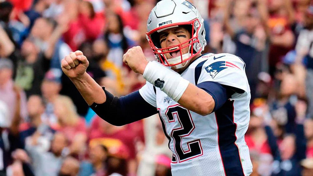 Brady celebra en un juego de los Patriots