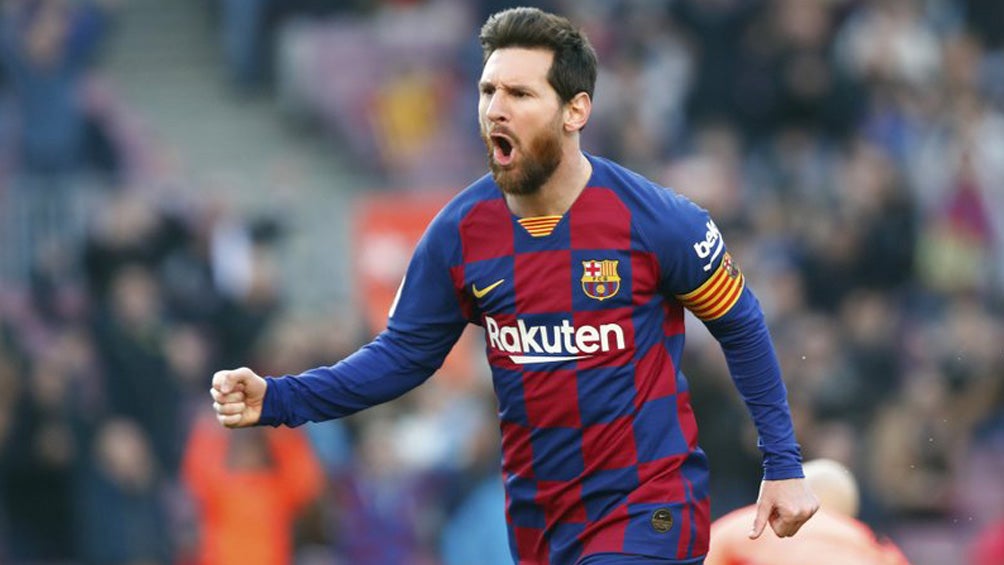 Leo Messi festeja un gol con el Barcelona