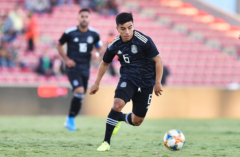 El 'Nene' en un partido con el Tri