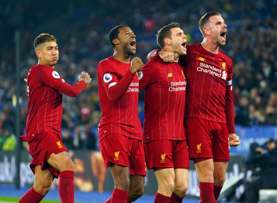 Jugadores de Liverpool celebrando un gol