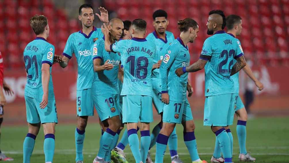 Jugadores del Barcelona festejan una de las dianas contra el Mallorca