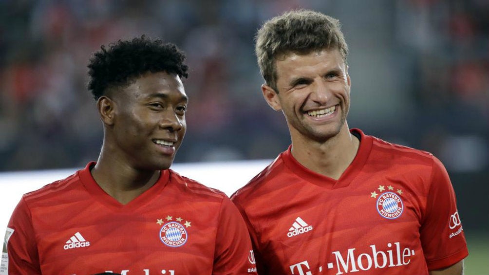 Alaba y Müller en partido con el Bayern