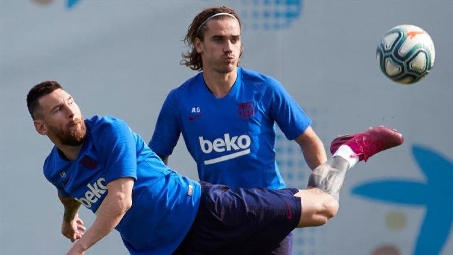 Messi y Griezmann durante un entrenamiento con Barcelona