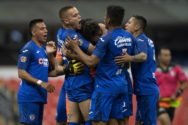 Jugadores de La Máquina celebran tras vencer al América