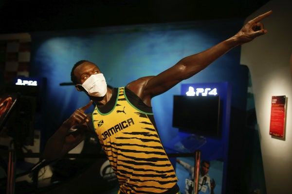 Usain Bot de cera en el museo Madame Tussauds 