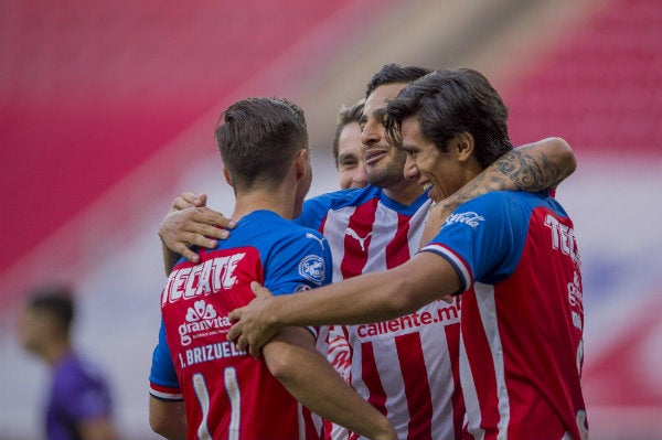 Jugadores del Rebaño celebran una anotación