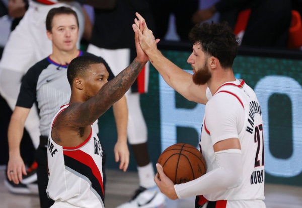 Damian Lillard y Jusuf Nurkic