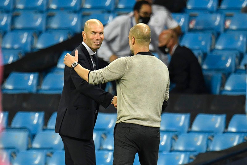 Pep Guardiola platica con Zidane tras el duelo de Champions 