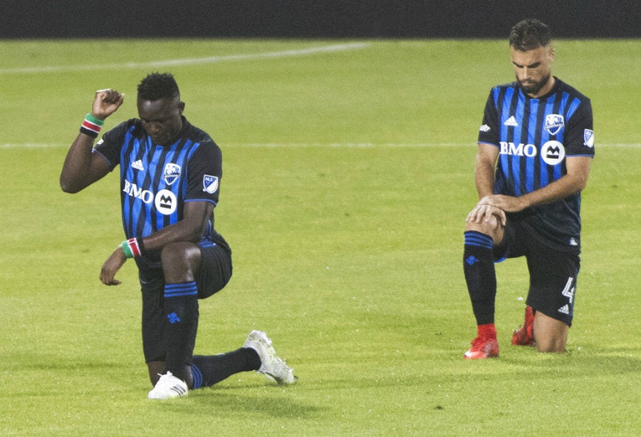 Jugadores del Impact de Montreal durante la protesta