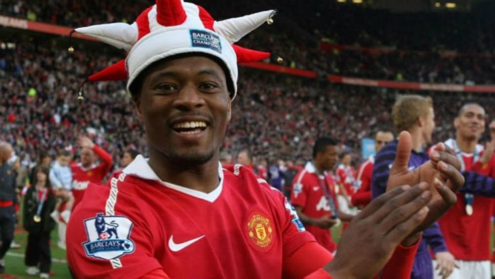 Patrice Evra, en festejo con el Manchester United