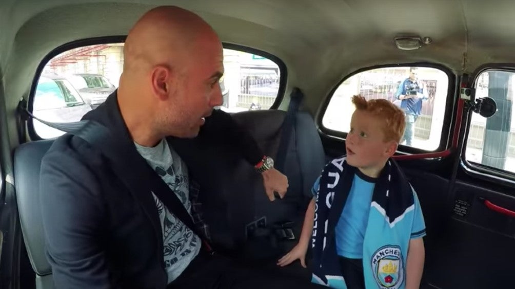 Guardiola junto al pequeño Met Braydon