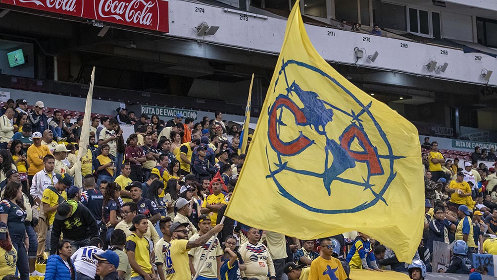 Aficionados de América durante un partido