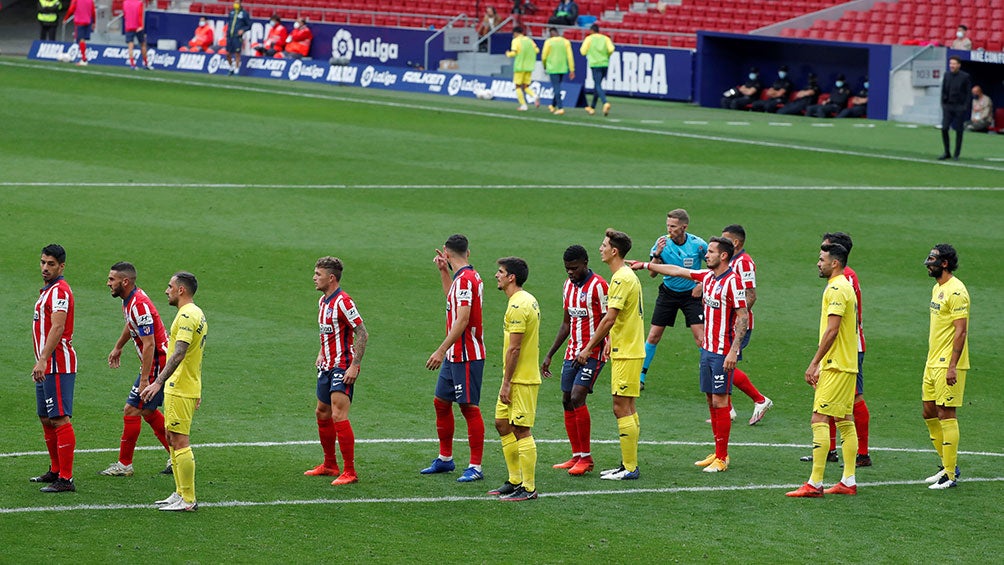 Jugadores de Atlético y Villarreal durante un partido