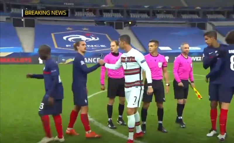 Griezmann en saludo con CR7