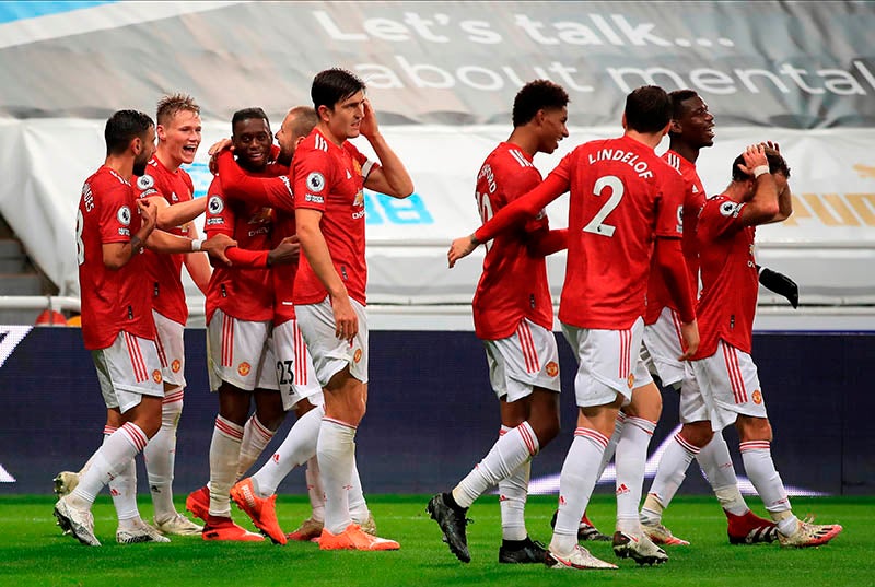 Jugadores del Manchester United durante un duelo 