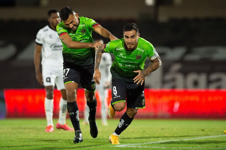 Lezcano y Marín celebran gol ante Querétaro