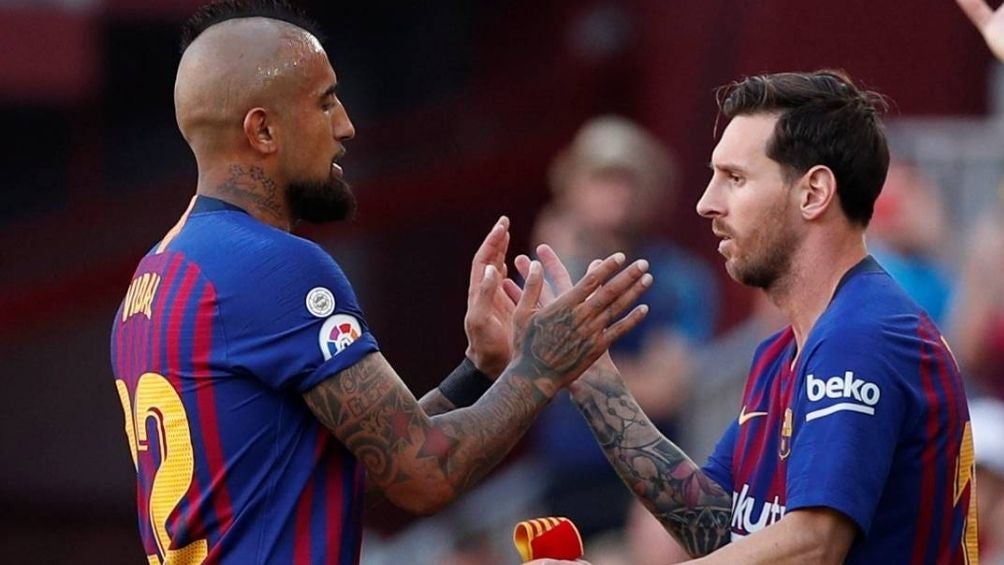 Vidal y Messi en el Barcelona 