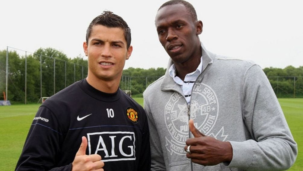 Cristiano Ronaldo y Bolt durante un evento 