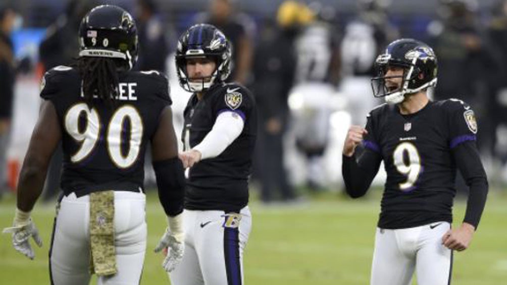 Los Ravens festejan una jugada