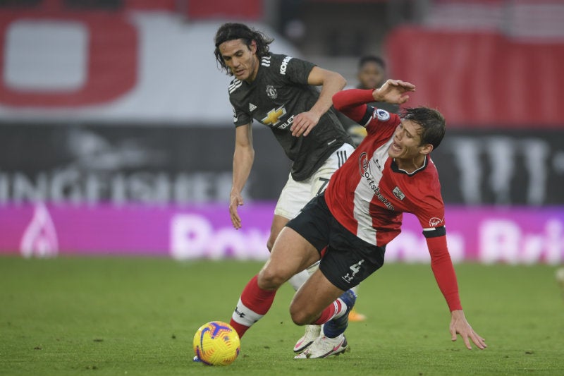 Cavani en partido con United