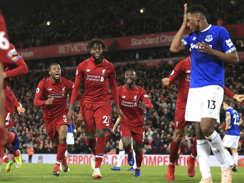 Divock Origi festeja un gol con los Reds