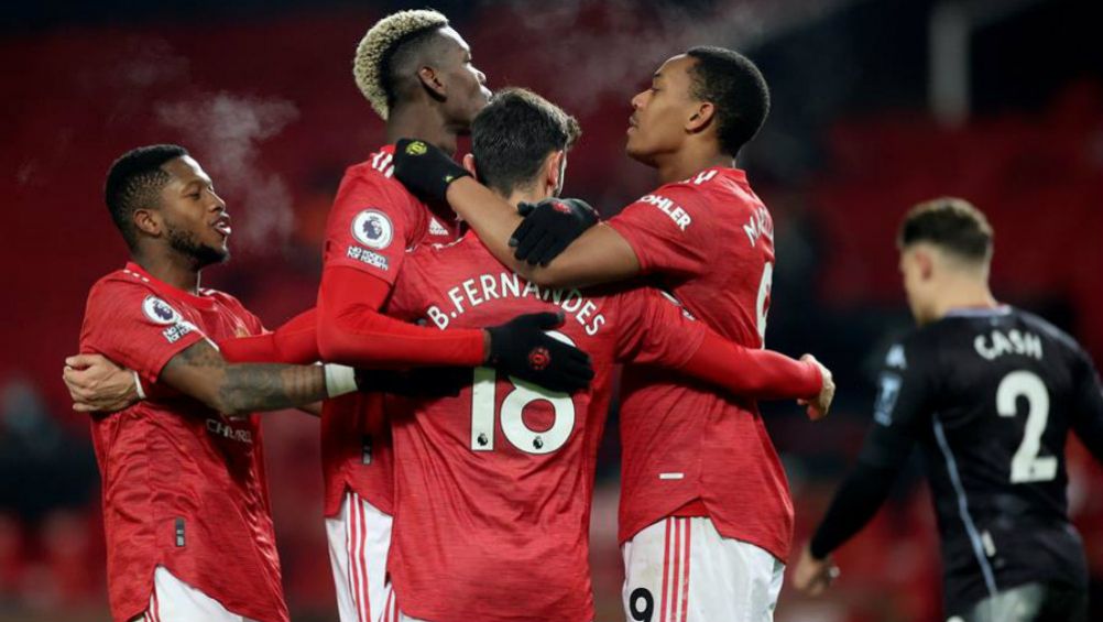 Jugadores de Manchester United en festejo