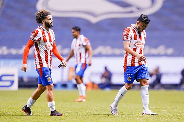 César Huerta y Alexis Vega al final del partido 