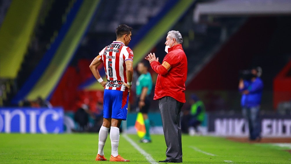 Vucetich y Molina durante un partido con Chivas