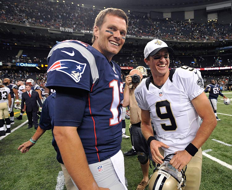 Brady y Brees posan antes de un juego en 2013