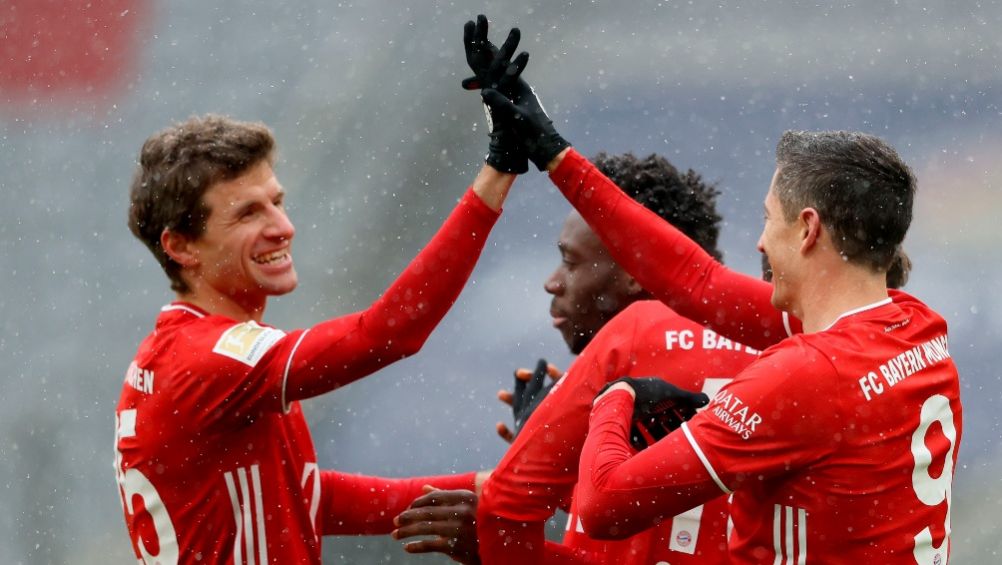 Thomas Müller y Robert Lewandowski celebrando un gol conseguido