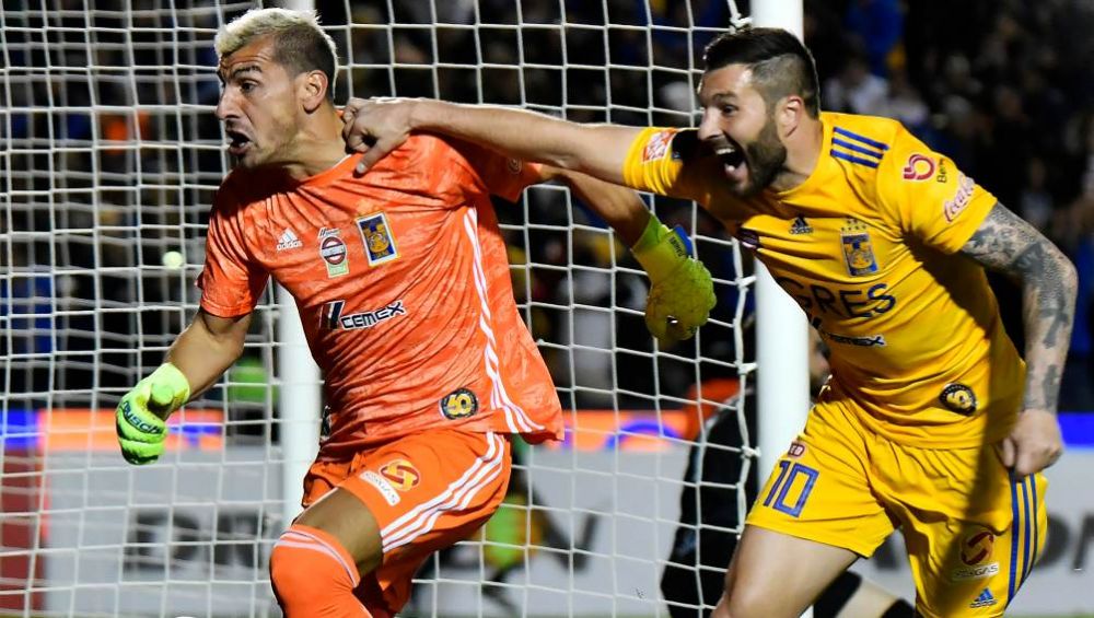 Nahuel Guzmán y Gignac en festejo con Tigres