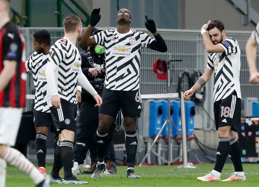 Paul Pogba festejando con sus compañeros ante el Milan