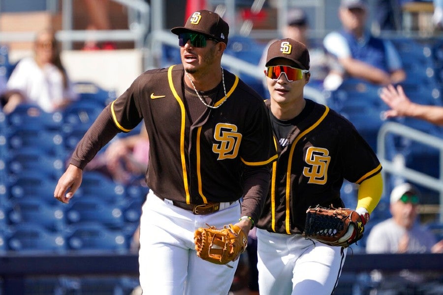 Manny Machado (I) en un partido con los Padres