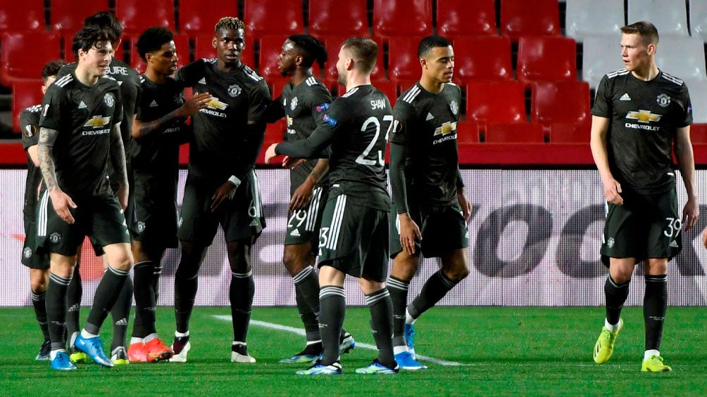 Jugadores del Manchester United celebran un gol ante Granada 