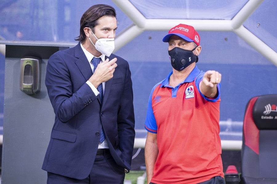 Pedro Troglio junto a Santiago Solari