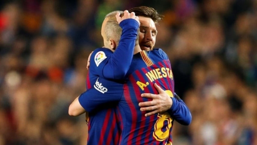 Messi e Iniesta festejando un gol a favor del Barcelona