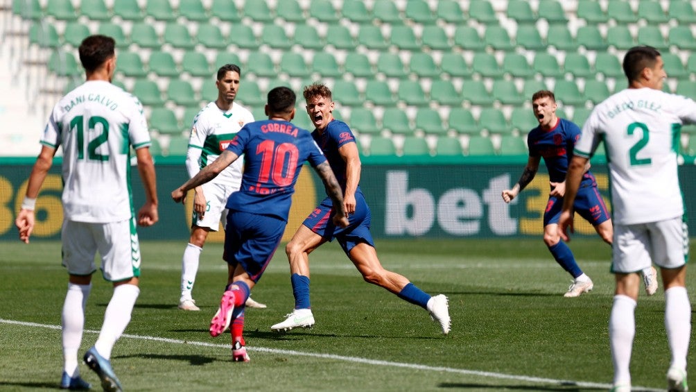 Marcos Llorente celebra gol con el Atlético de Madrid