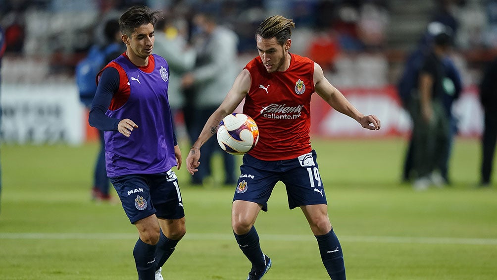 Jesús Angulo junto a Brizuela previo al juego ante Pachuca