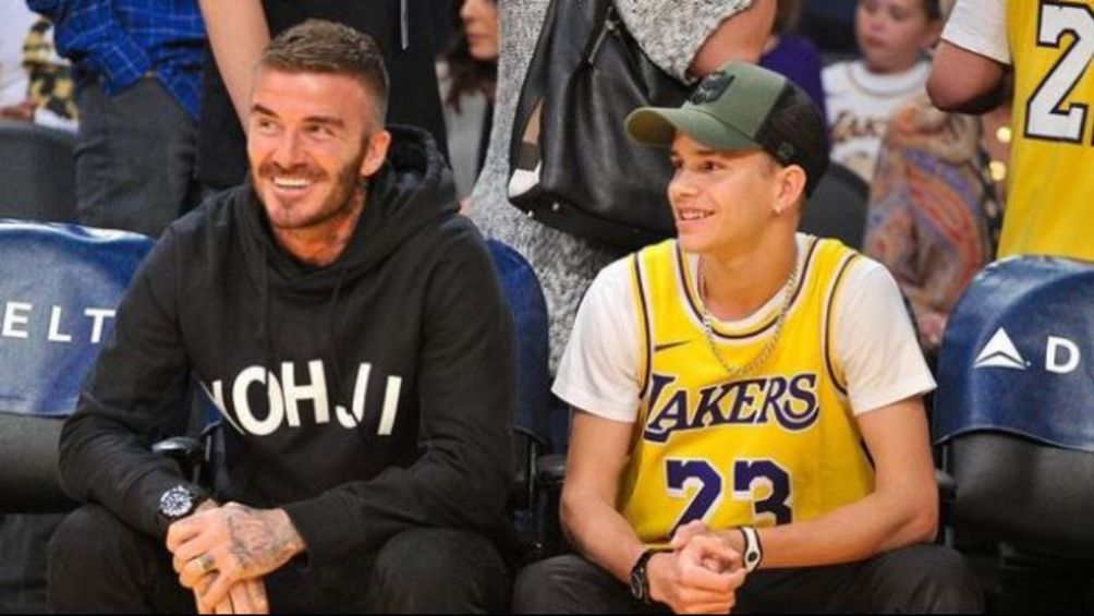 David Beckham y su hijo Romeo en un partido de los Lakers