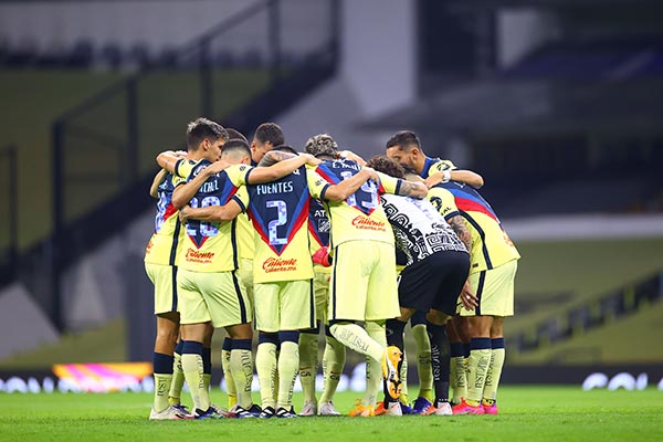 Jugadores de América previo a un partido 