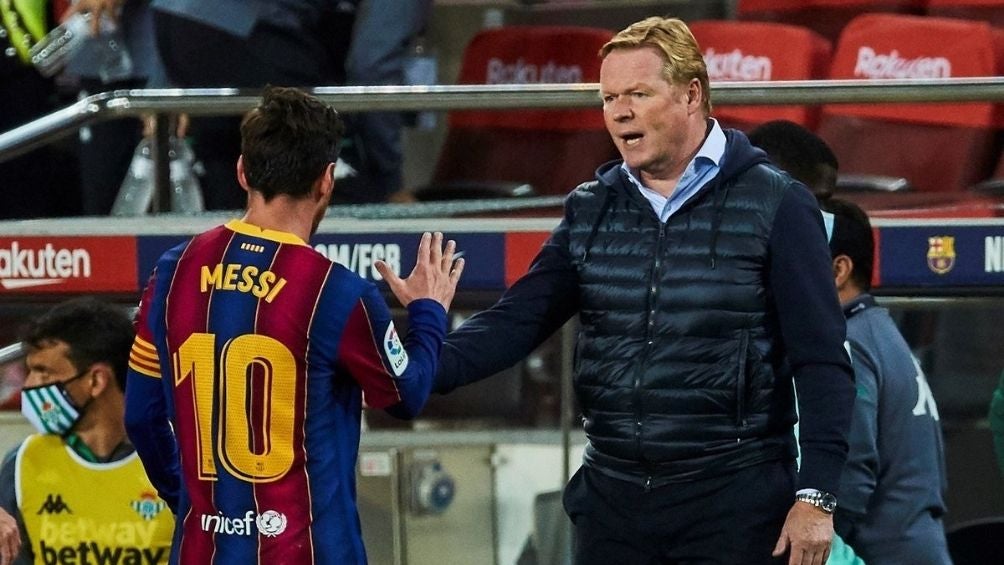 Messi y Koeman en un partido 