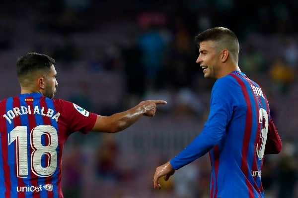 Jordi Alba y Gerard Piqué con el Barcelona