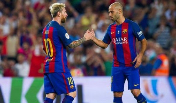 Leo Messi junto a Javier Mascherano en el Barcelona