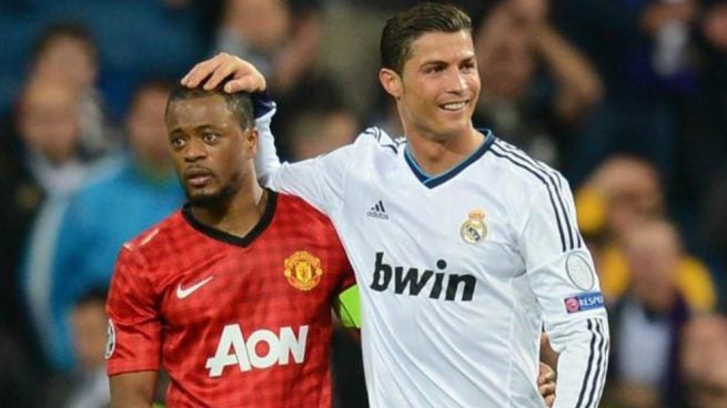 Evra y R7 en un partido