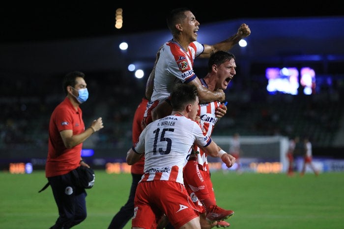 Jugadores del San Luis en festejo 